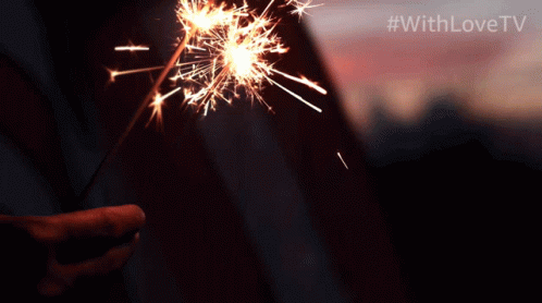 Person Holding Sparkler July 4