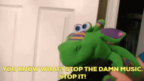 Person Holding Stuffed Animal Saying Stop Damn Music