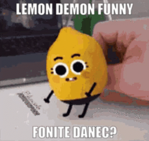 Person Holding Stuffed Lemon With Face and Legs