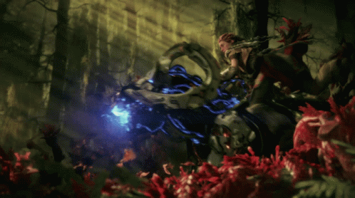 Person Holding Sword In Dark Forest GIF