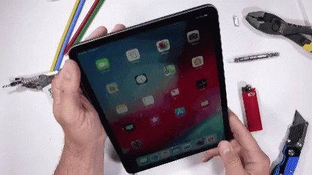 Person Holding Tablet Saying Date Is 13