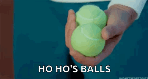 Person Holding Tennis Balls Ho Ho 's Balls