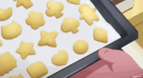 Person Holding Tray of Cookies