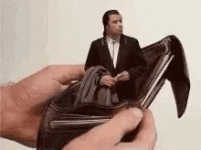 Person Holding Wallet With Man In Suit Picture GIF