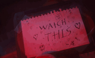 Person Holding Watch This Sign