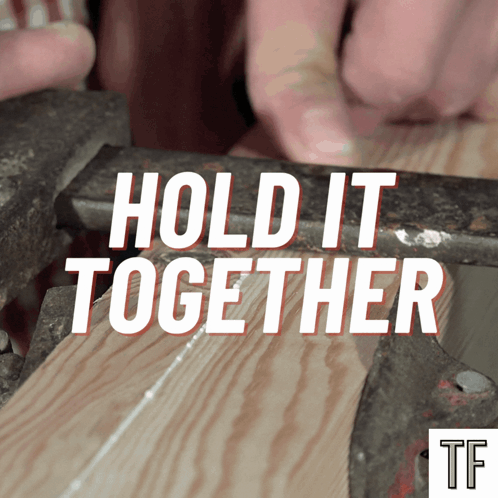 Person Holding Wood in Vise
