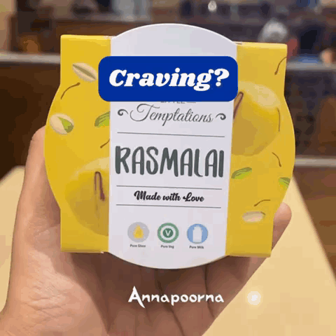 Person Holding Yellow Rasmalai Box Made With Love