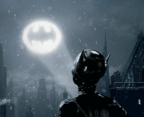 Person in Batman Costume Looking at Moon