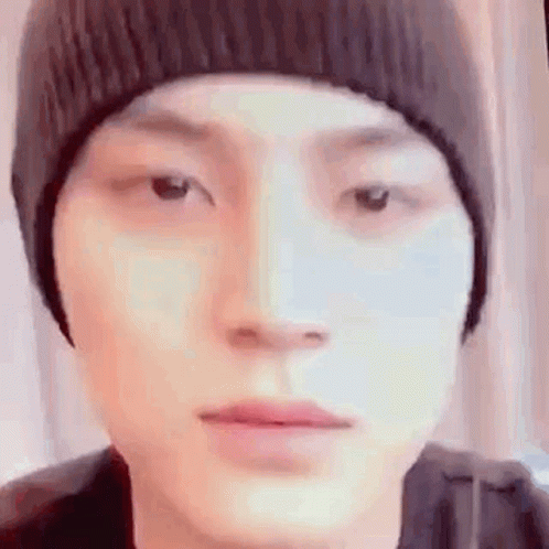 Person in Beanie Looking at Camera