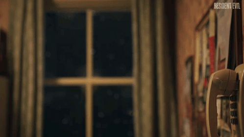 Person In Beanie Talking On Phone Resident Evil GIF