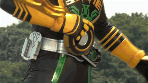 Person in Black and Yellow Costume With Circle Belt