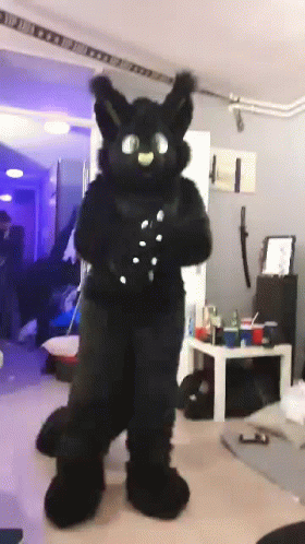 Person in Black Furry Costume Dancing