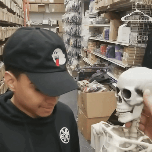 Person in Black Hat With Ghost