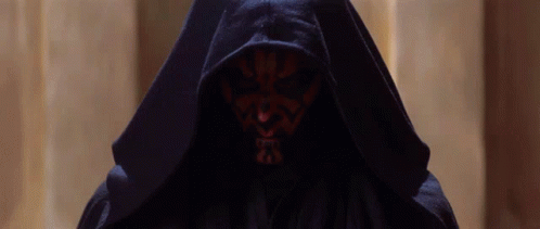 Person In Black Hooded Robe With Red Face GIF