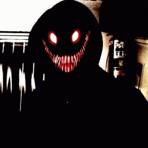 Person in Black Hoodie With Scary Face and Red Eyes