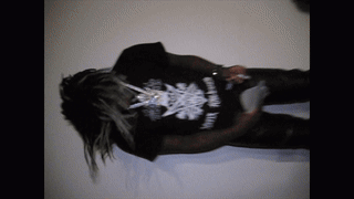 Person in Black Shirt With Unicorn