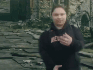 Person in Black Sweatshirt With Letter R Blurry