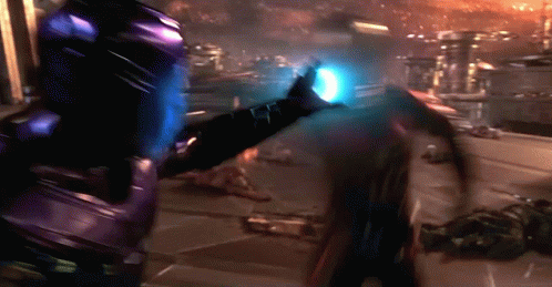 Person in Blue Suit Holding Blue Object