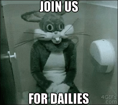 Person in Bunny Costume Sitting on Toilet