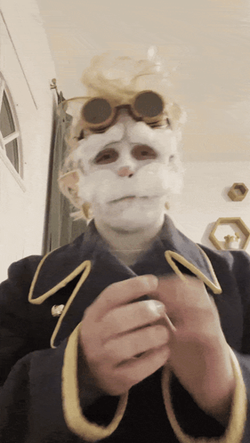Person In Costume With White Face And Goggles GIF