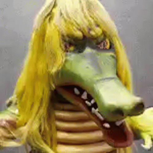 Person in Crocodile Mask with Yellow Hair