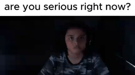 Person In Dark Room Looking At Computer Screen GIF