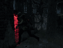 Person in Dark Room With Red Light Behind