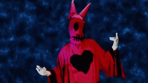 Person in Devil Costume with Heart