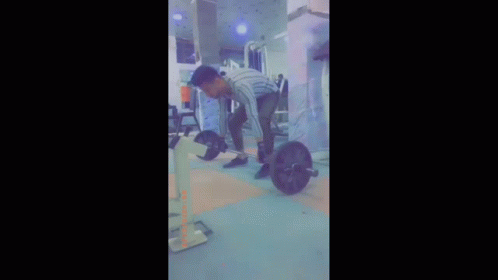Person In Front Of Chalkboard With K + A GIF