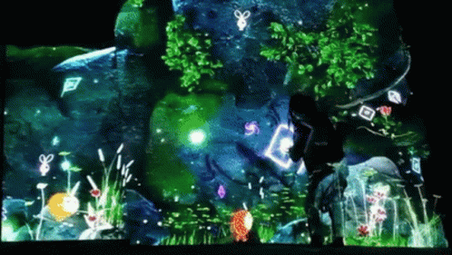 Person in Front of Screen With Flowers and Trees