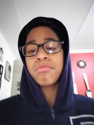 Person in Glasses and Hoodie With Letter D