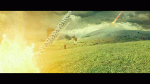 Person In Grassy Field With Flying Rocket GIF