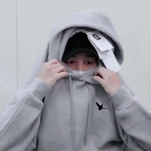 Person In Grey Hoodie Covering Face GIF