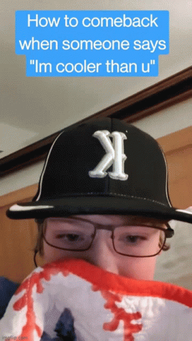 Person in Hat and Glasses How to Comeback When Someone Says I'm Cooler Than U