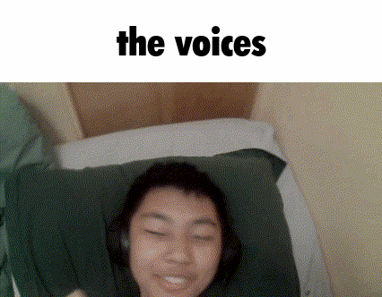 Person In Headphones Lying On Bed The Voices GIF