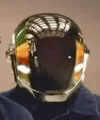 Person in Helmet and Blue Shirt