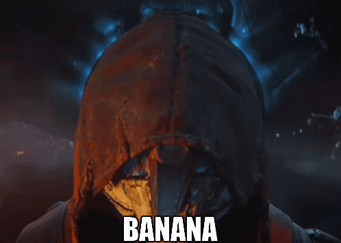 Person in Hood With Banana