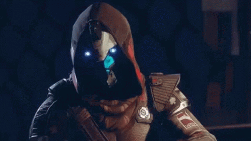 Person in Hooded Jacket and Mask with Blue Eyes
