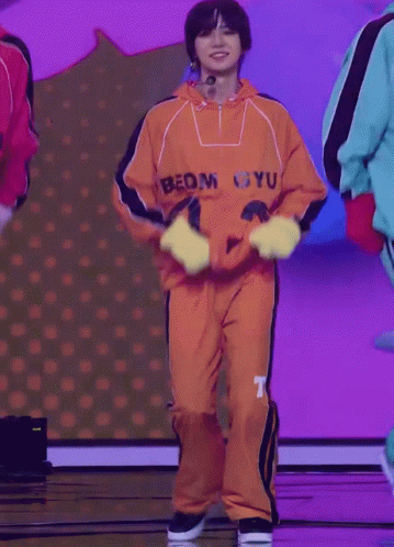Person in Hoodie Saying Room Gyu