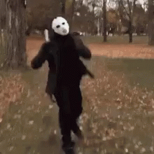 Person in Jason Voorhees Costume Walking in Park
