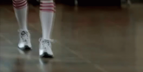 Person In Knee High Socks And Sneakers Walking GIF