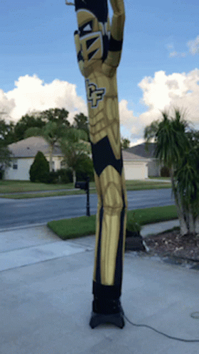 Person in Knight Costume with Letter U