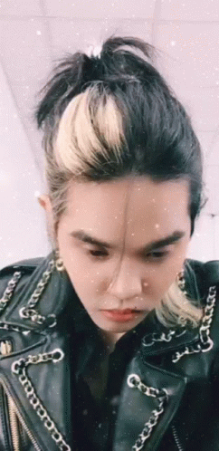 Person in Leather Jacket with Chains