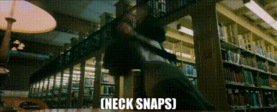 Person In Library Neck Snaps GIF