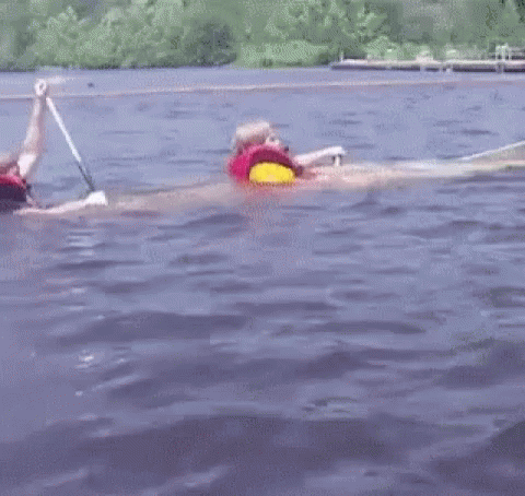 Person In Life Jacket Swimming GIF