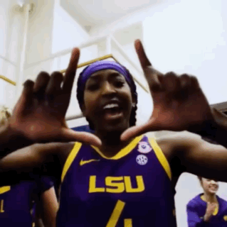Person in LSU Hat and Blue Jacket