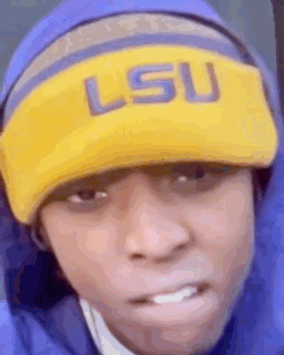 Person in LSU Hat and Blue Jacket