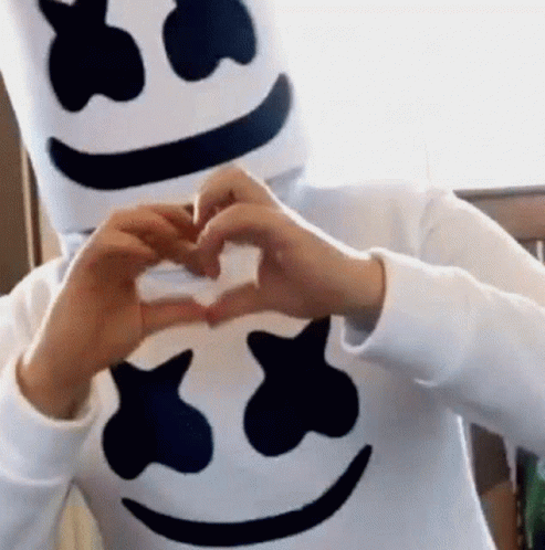 Person In Marshmello Costume Making Heart Shape GIF