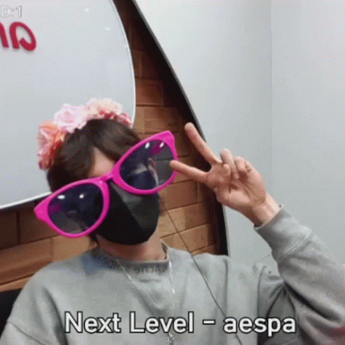 Person In Mask And Pink Sunglasses Next Level Aespa GIF