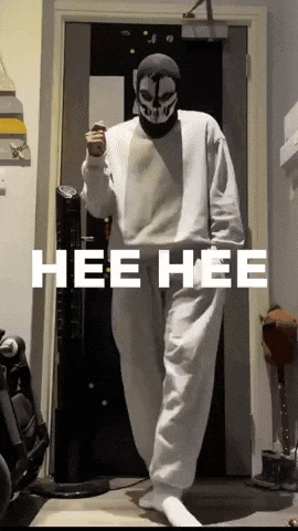 Person in Mask Standing in Front of Door Saying Hee Hee